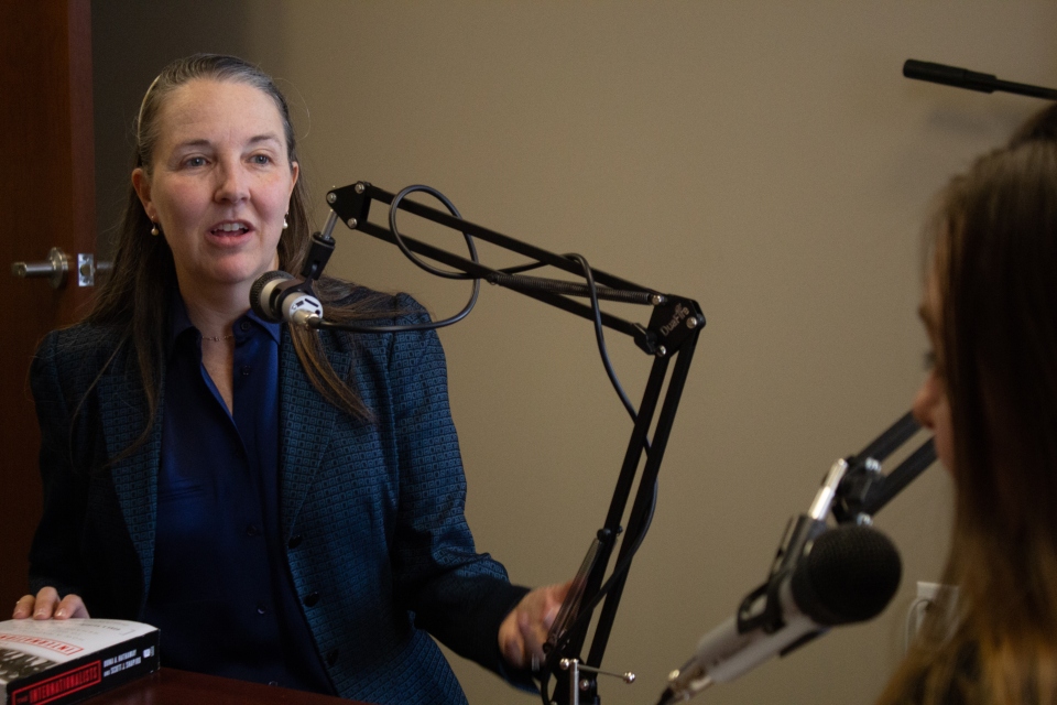 photo of professor monica eppinger in the podcast studio