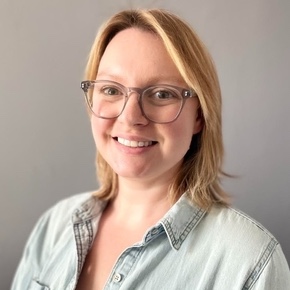 Theresa Martin smiling in a professional headshot.