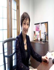 Headshot of Gai Yan Min